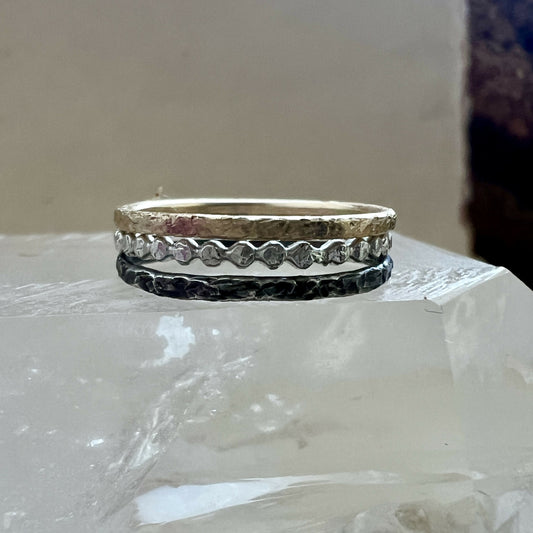 Set of three stacking rings 9ct gold, sterling silver